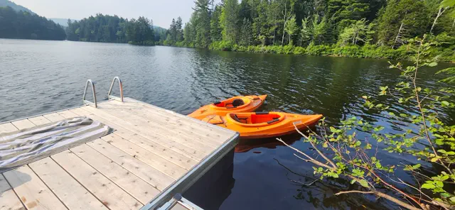 Kayaks at the private dock in summer